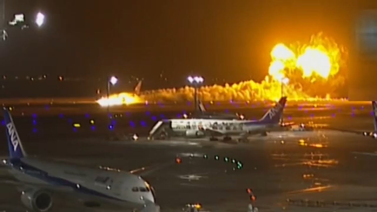 Japan Airlines plane collides with coast guard aircraft, bursts