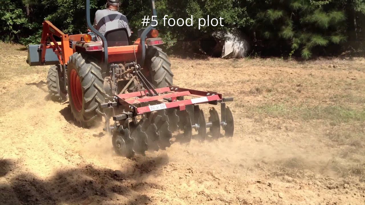 2014 food plot discing - YouTube