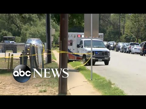 14 students, 1 teacher dead in school shooting