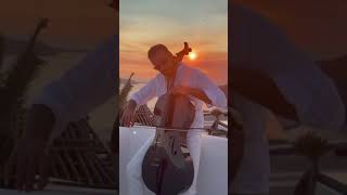 Hauser with the Beautiful Sunset while playing Someone You loved-