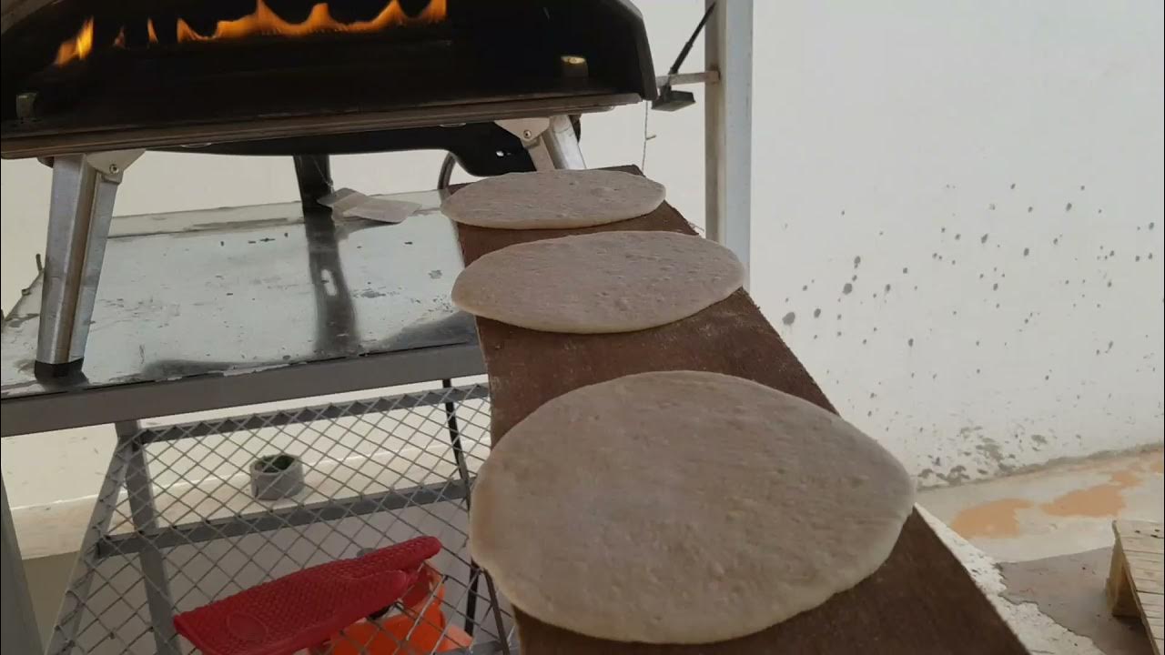 Pita bread making with the ooni koda 16 خبز منفوخ YouTube
