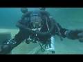 Female Diver is Diving with BARE Shell Drysuit and Rebreather