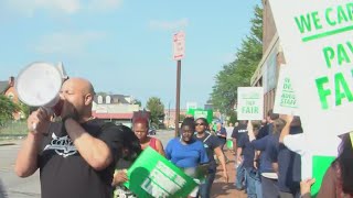 Workers rally over Rochester Housing Authority negotiations