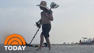 Group effort helps find missing ring for beach proposal