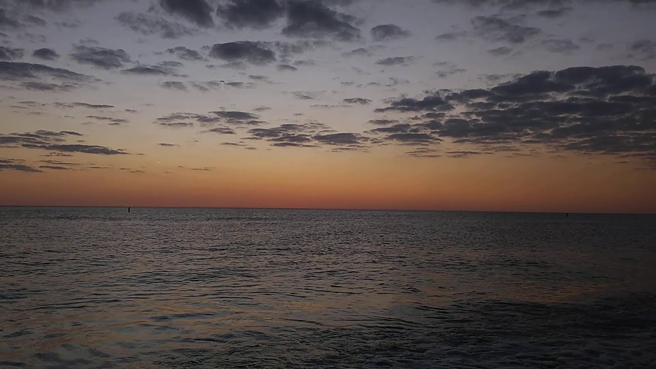 2020 Florida beach week with Jeff and Heather. Madeira beach sunset Florida listen to waves and