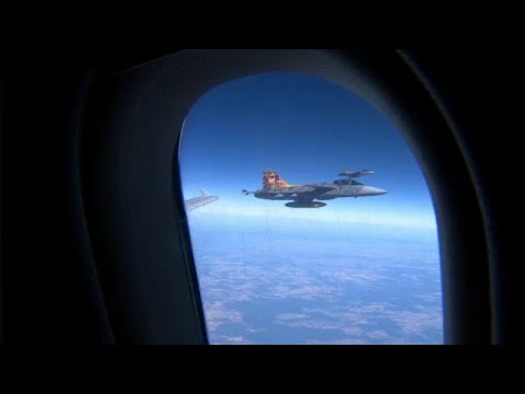 On board of a NATO plane during a military exercise