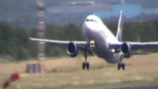 Airbus A320 Nouvelair take off from Dortmund
