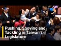 Taiwan lawmakers tussle over controversial reforms  taiwanplus news