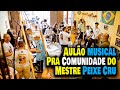 I aulo de musicalidade e ritmo para a comunidade  de estudos da capoeira na casa mestre ananias