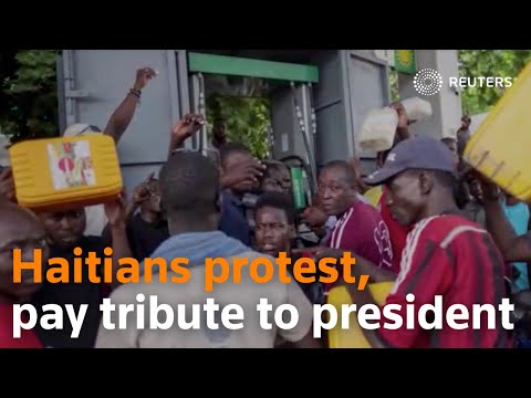 Haitians protest, pay tribute to president