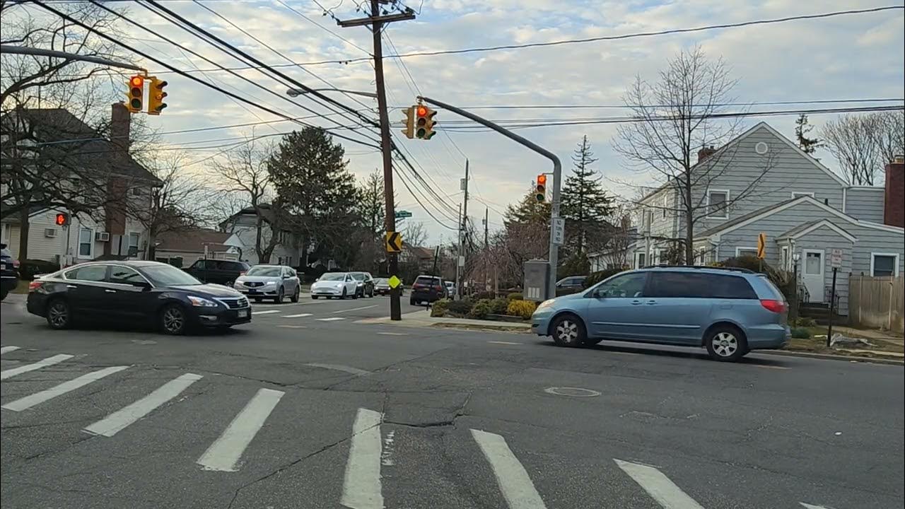 Driving in local streets of Cedarhurst to Rockaway TPke W, stop at