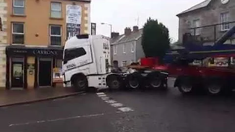 Truck Driver Towing Massive Wind Turbine Expertly ...