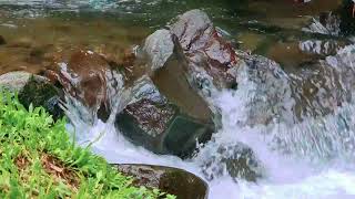 The sound of a clear river flowing from a mountain waterfall, ASMR nature sounds, meditation, sleep