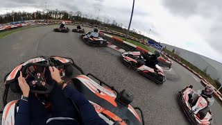 Competitive racing at racing at Micheal Schumacher Karting Center in Germany. Wet spots on track