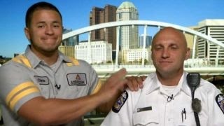 Man reunites with cop who saved him from drowning