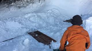 Dutifully dropping snow using toyo(wooden slide) Removing snow @ Oike, Tokamachi, Tokamachi, Japan