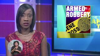 POLICE SEARCH FOR TWO ARMED ROBBERY SUSPECTS