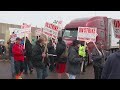 Beer truck drivers union members go on strike