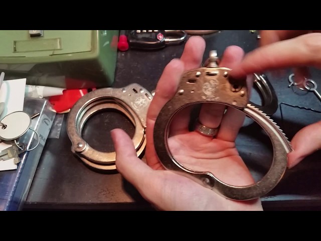 93) Smith & Wesson Model 104 Maximum Security handcuffs 