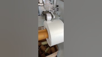Synthetic Mica Tape being wound onto a spool