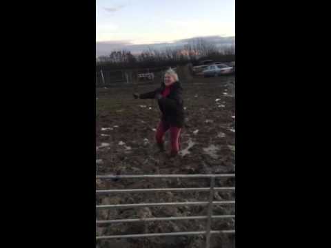 Woman falls in mud