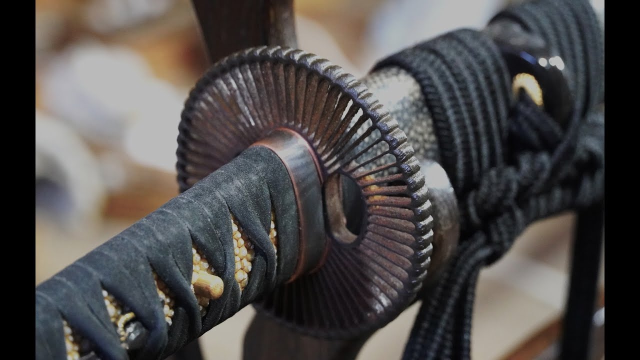 Katana making, fuchi.
