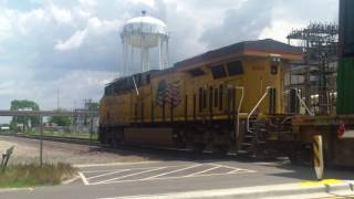 UP 8586 leading EB stacktrain races UP 8264 leading EB stacktrain with DPU