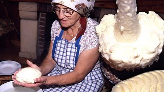Artisanal butter. Milking of milk and manual elaboration of this food | Documentary film