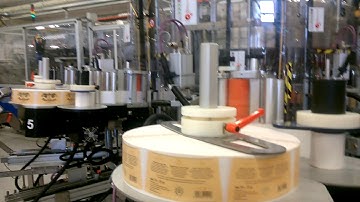 Kosme Labeler in production-13.000b/h PS+CG in syncro with filler+divider