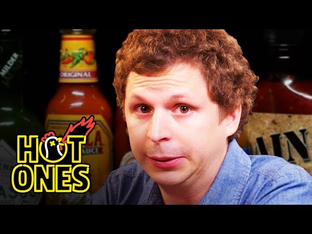 Michael Cera Experiences Mouth Pains While Eating Spicy Wings | Hot Ones | First We Feast