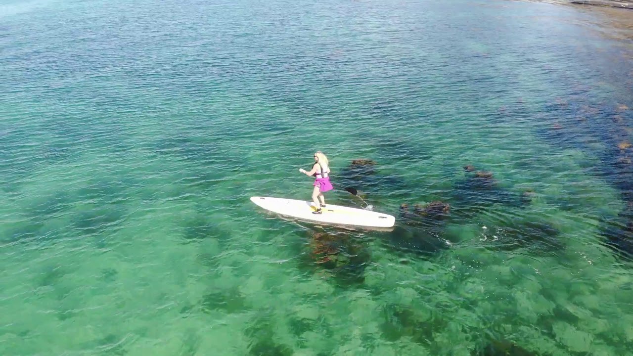 SUP paddling in the Norwegian sea