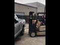 Kid driving forklift truck crashes into truck