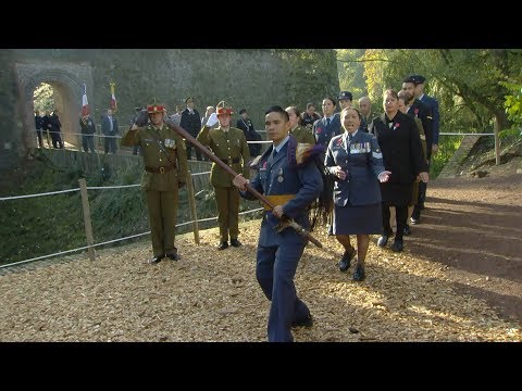 The New Zealand Defence Force records the 2018 centenary service at the New Zealand Memorial set into Le Quesnoy’s ramparts. The ceremony places the town’s connection with New Zealand in a contemporary civic setting, with participants and memorial traditions visible on site. It is a commemoration rather than a reconstruction of the 1918 assault, and its footage adds a distinct memory-focused perspective.