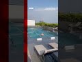 Rooftop pool seen shaking as 7.4 magnitude earthquake hits Taiwan. #Taiwan #BBCNews