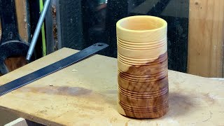 Richard Raffan turns a crossgrain tripod pencil pot.