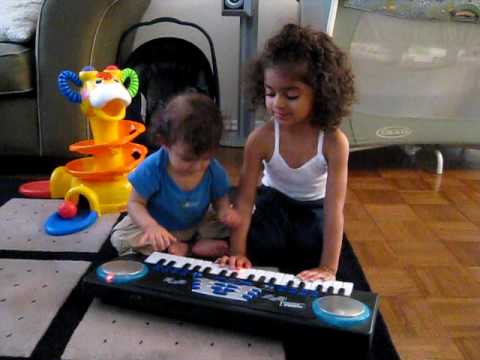 Kina and Krish on the Piano