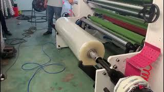 How to load the jumbo roll onto the tape slitting machine easily? Auto hydraulic oil loading device