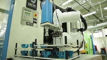 Asservimento macchina utensile con cobot Doosan Robotics