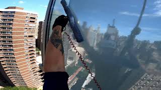 Washing windows of a high-rise building in New York
