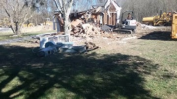 Bobcat E42 tearing down old house