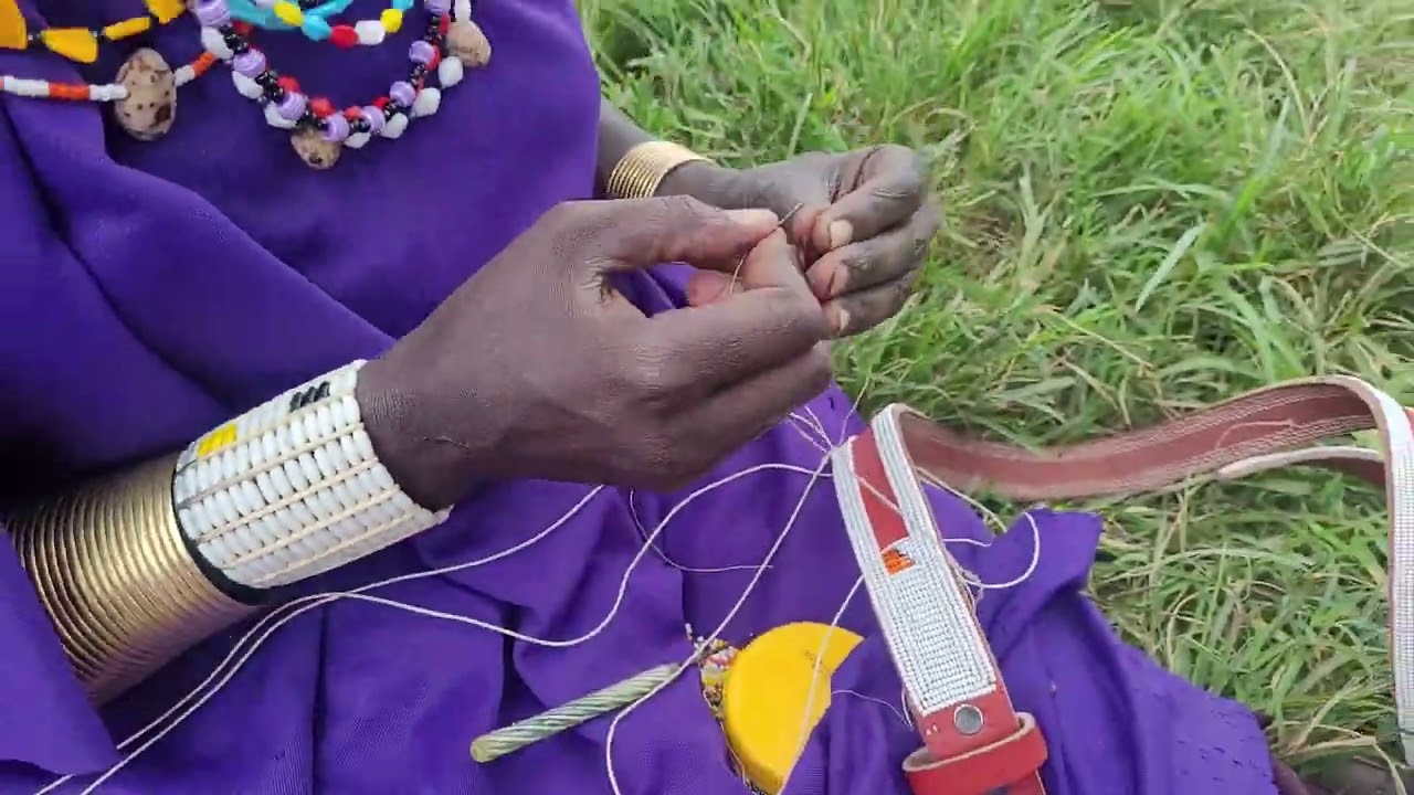 Maasai women crafting beadwork.