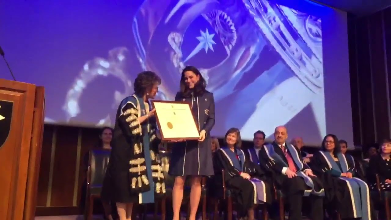 The Duchess is presented with a certificate by Professor Lesley Regan, the President of RCObsGyn.