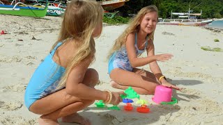 Children playing on the beach 4K