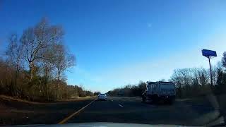 Morning drive along I 95 North in Massachusetts with traffic