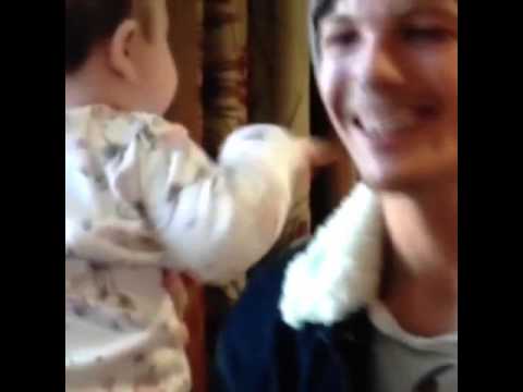 louis tomlinson baby playing