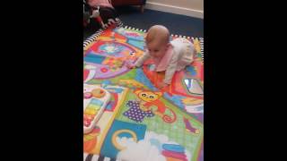 Karalou crawling backwards