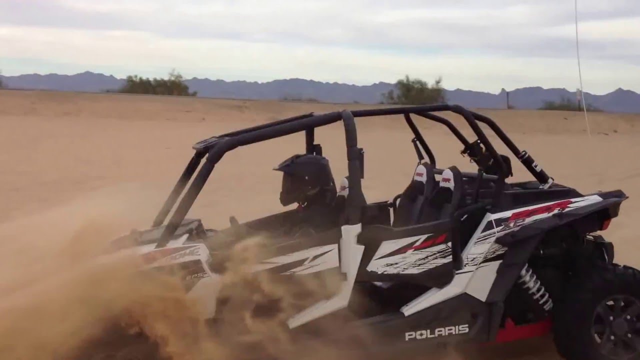 Jumping Rzr Polaris RZR XP4 1000 jumping at Glamis - YouTube
