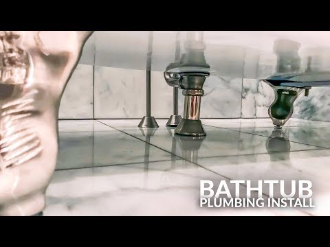 installing-bathtub-plumbing-vintage-clawfoot-tub-faucet-and-hand-shower