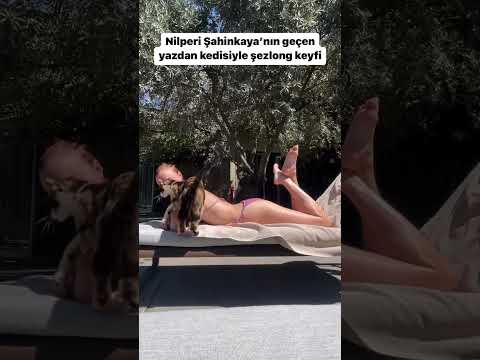 NİLPERİ ŞAHİNKAYA'NIN GEÇEN YAZDAN KALMA ŞEZLONG KEYFİ