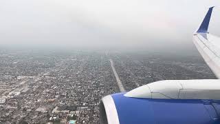 United Boeing 757-200 marine layer landing LAX from DEN RWY 25L 5-16-2024